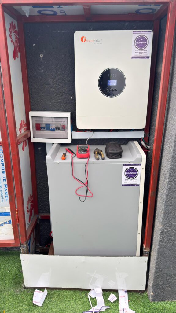 Solar installation safety: Properly installed Felicity Solar inverter and battery system with circuit breaker and tools, demonstrating safe and professional solar power setup in Nigeria.